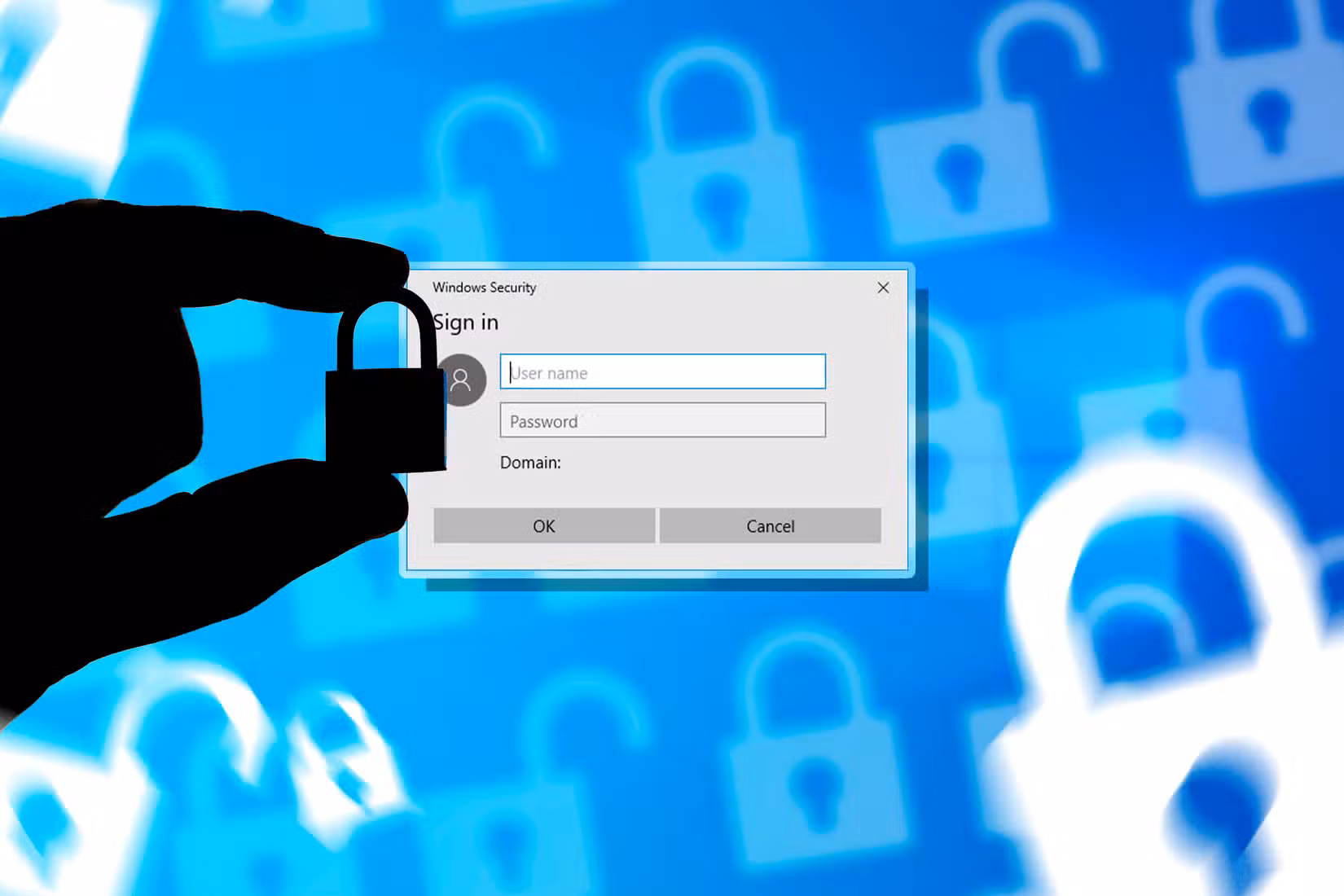 /de/images/a-hand-holding-a-padlock-and-windows-secure-sign-in-window.jpg