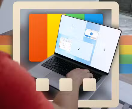 /de/images/a-man-using-a-laptop-with-the-fancyzones-feature-highlighted-and-the-powertoys-logo-in-the-background.jpg