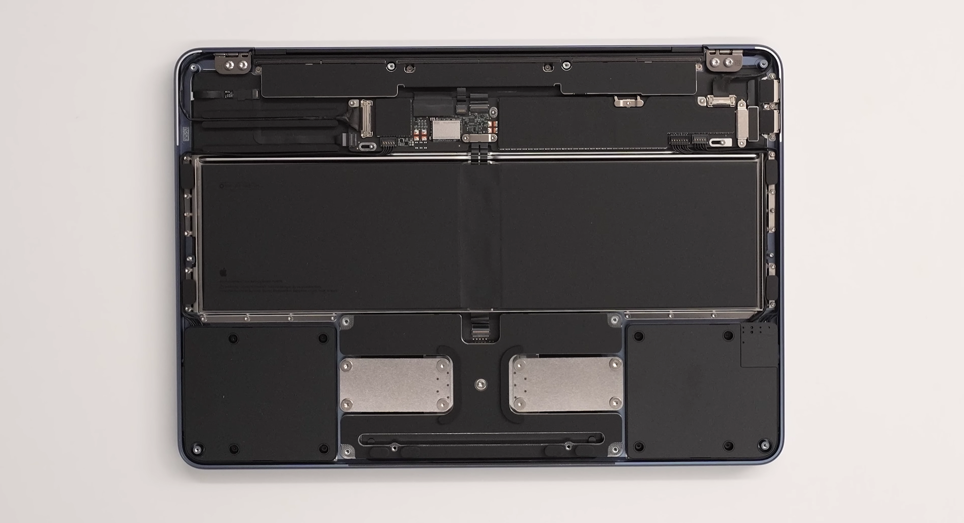 /fr/images/MacBook-Neo-trackpad-assembly.png