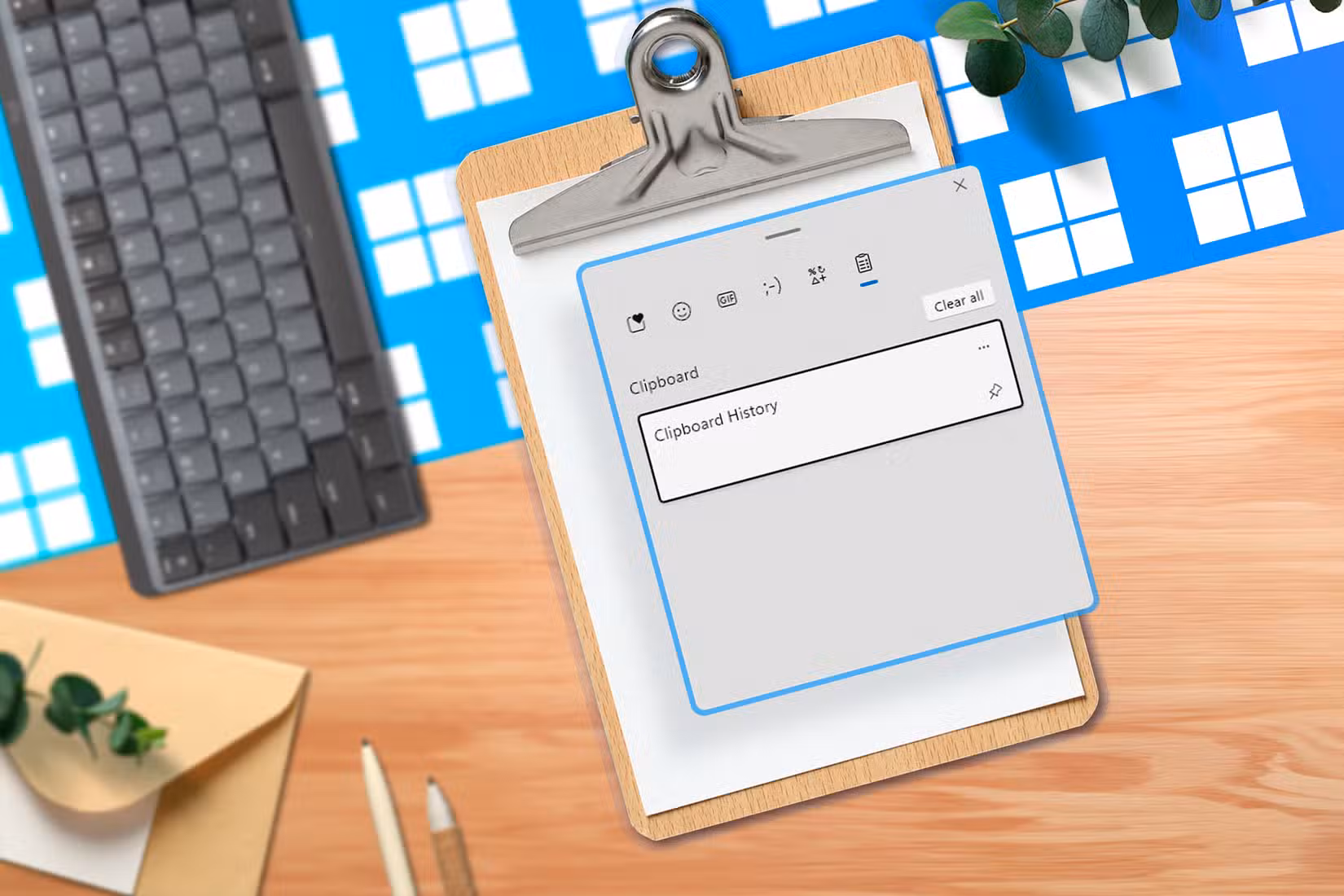 /fr/images/a-clipboard-with-a-screenshot-of-the-clipboard-history-on-a-wooden-desk-a-keyboard-next-to-it-and-several-windows-logos-in-the-background.jpg