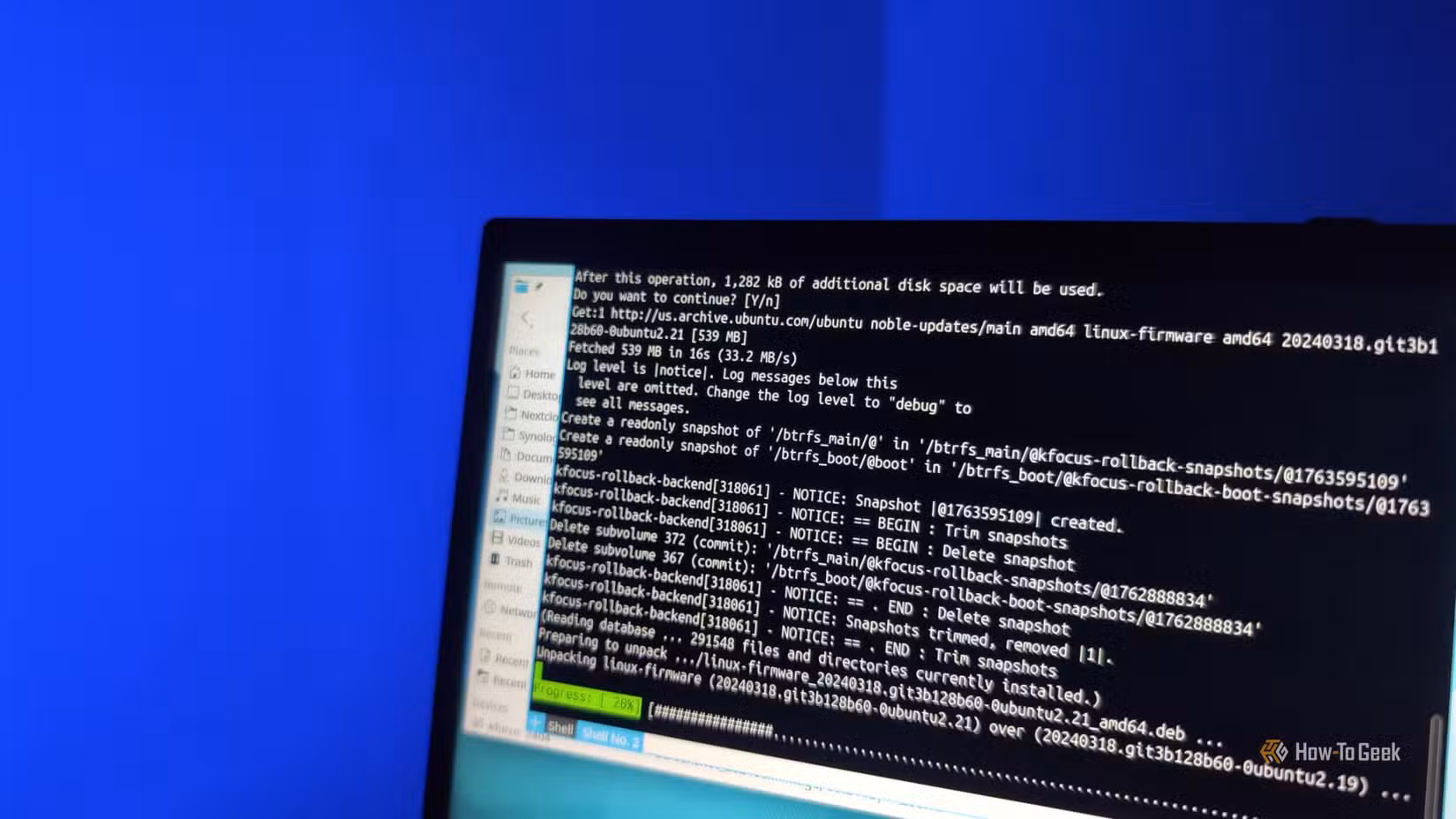/images/a-kubuntu-focus-laptop-screen-with-the-yakuake-terminal-emulator-for-linux-visible-and-an-apt-package-manager-ugprade-in-progress.jpg