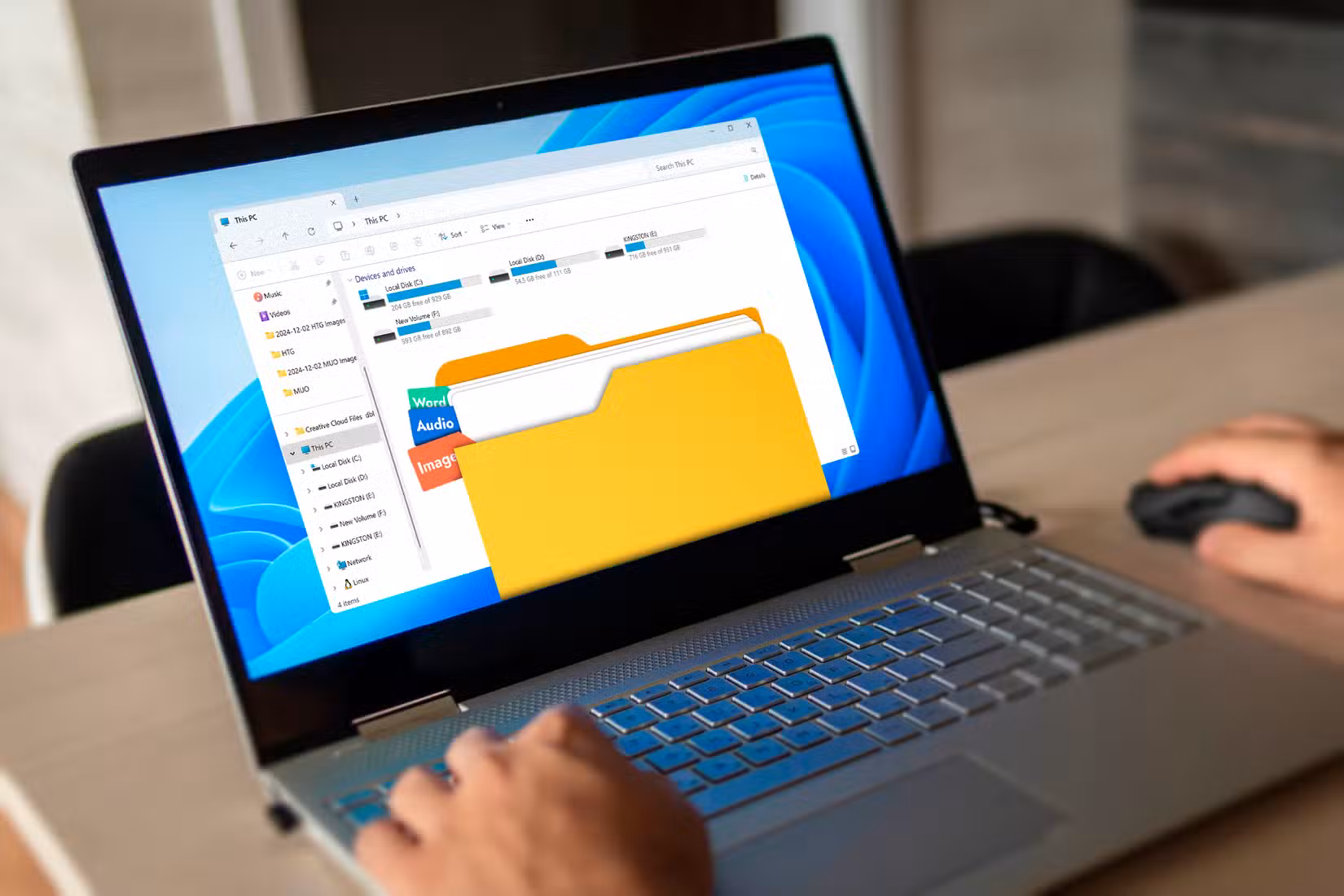 /images/a-laptop-with-the-file-explorer-open-and-the-icon-of-a-folder-with-some-files-and-tags.jpg
