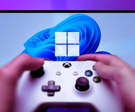 /images/a-person-holding-an-xbox-controller-and-windows-11-wallpaper-in-the-backgound.jpg