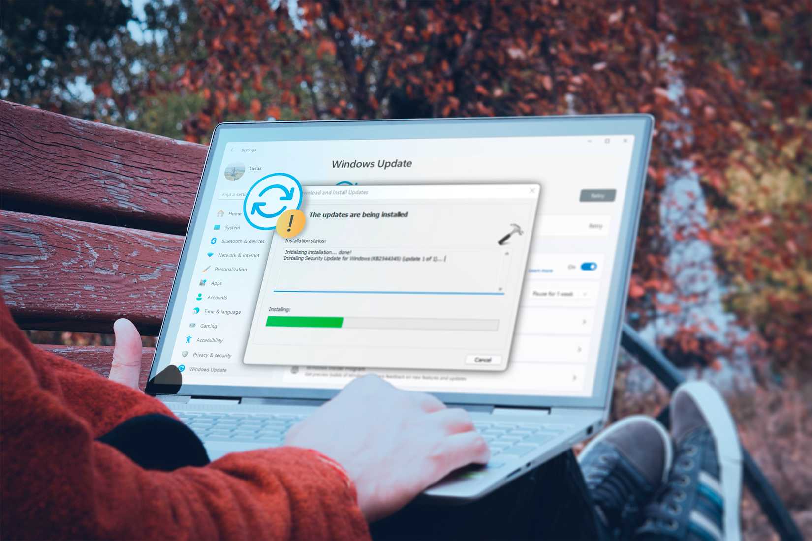 /images/a-person-using-a-laptop-with-windows-11-installing-updates.jpg