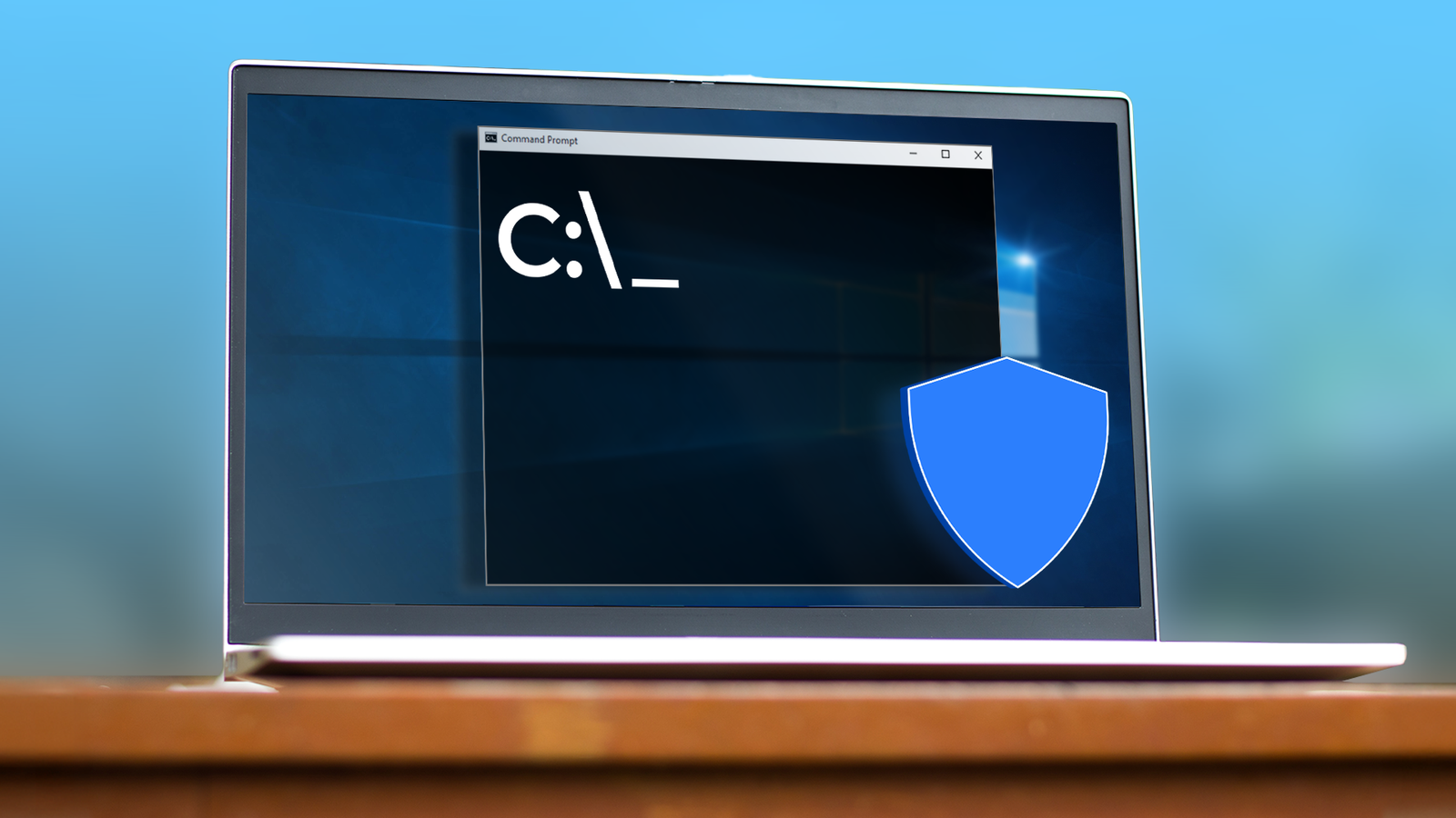 /images/laptop-screen-showing-the-windows-command-prompt-overlaid-with-a-blue-shield-icon.png