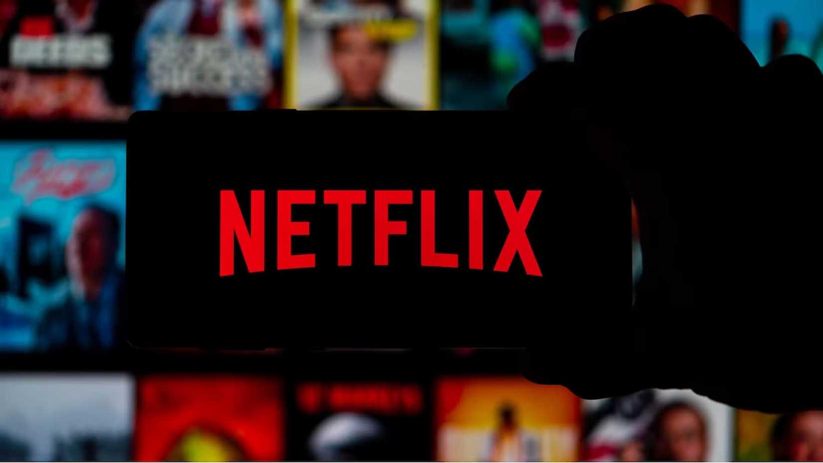 /images/person-holding-a-phone-with-the-netflix-logo-on-it.jpg