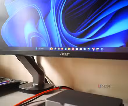/images/windows-11-default-background-monitor-arm-base.JPG
