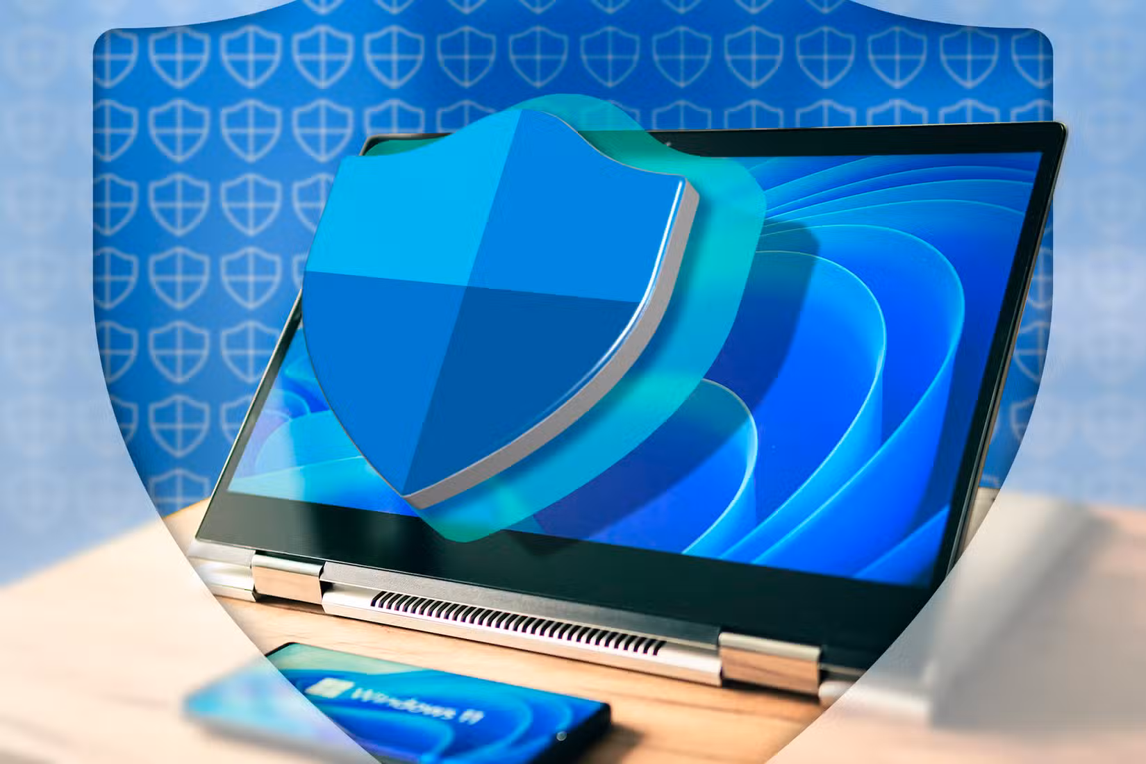 /th/images/a-laptop-with-windows-11-and-the-windows-defender-logo-in-front-of-the-screen.jpg