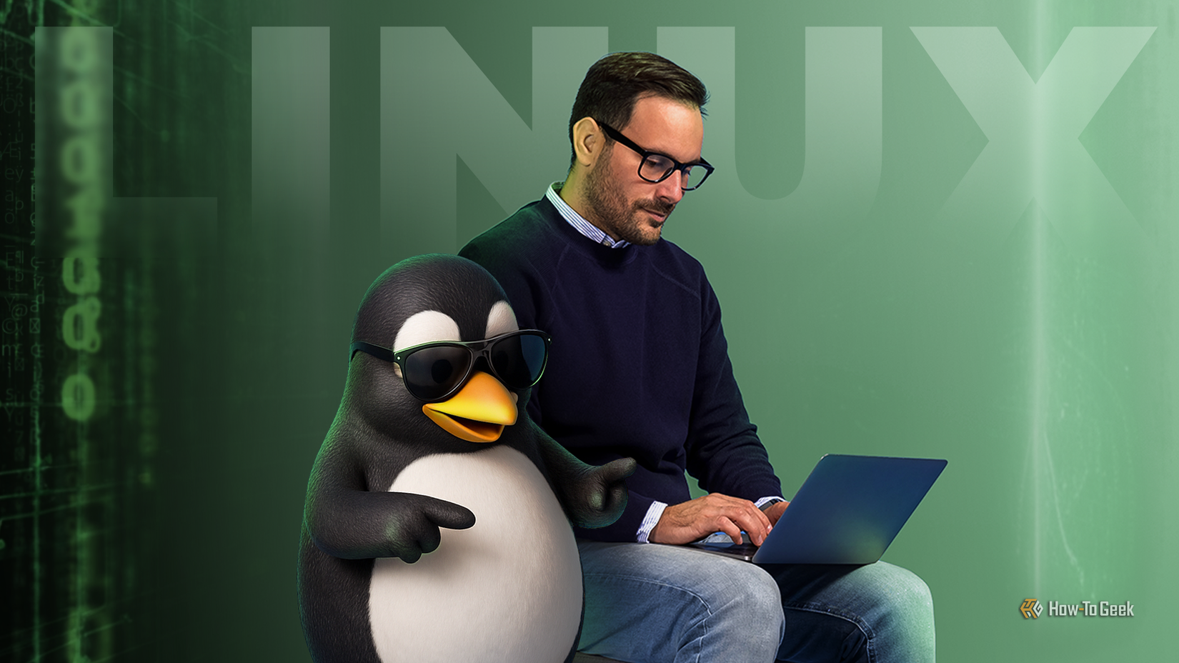 /th/images/a-man-using-a-laptop-next-to-tux-the-linux-mascot-wearing-sunglasses.png