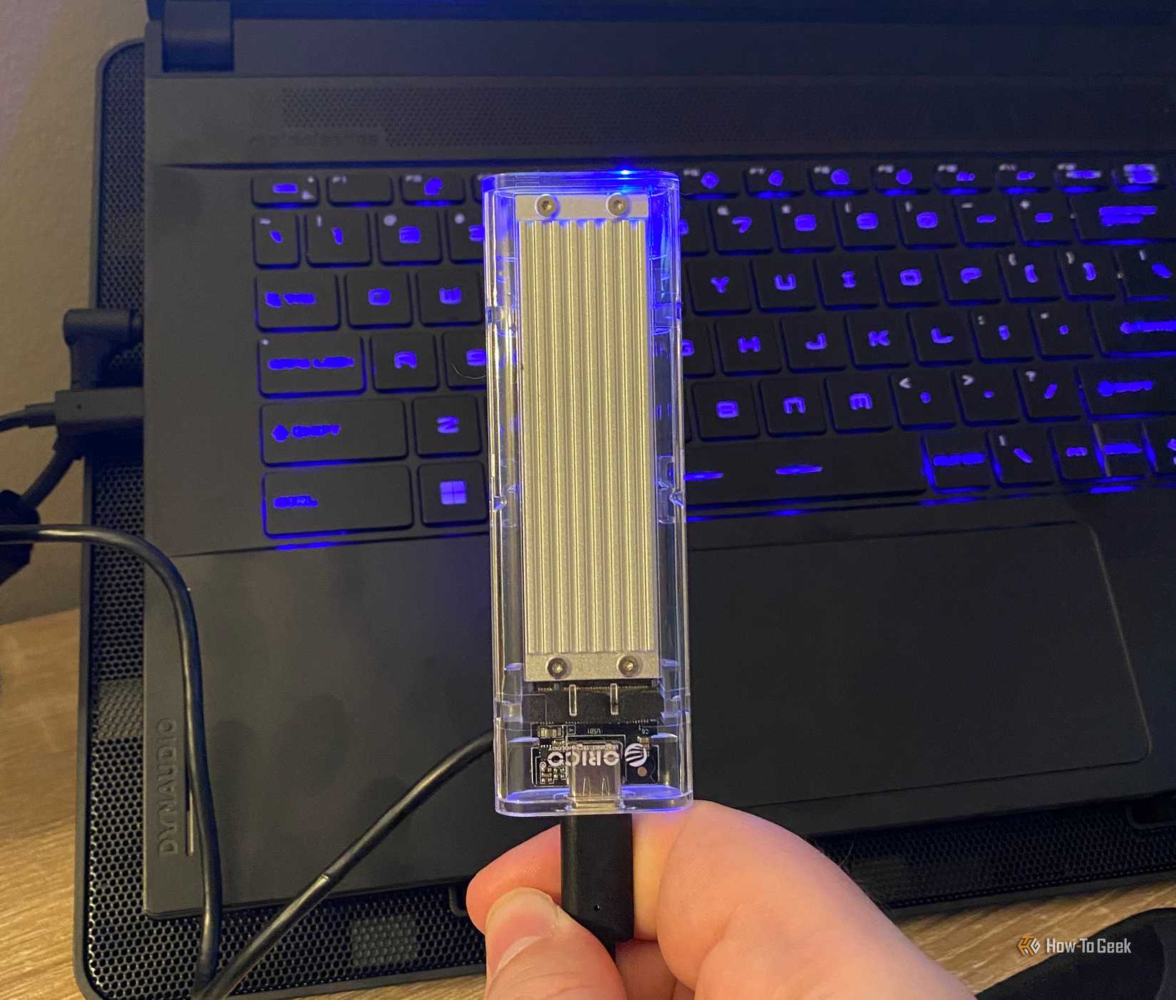 /th/images/a-usb-nvme-ssd-in-front-of-a-gaming-laptop.jpg